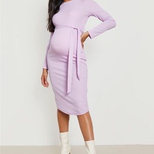TOO OIVUNU
MATERNITY RIB BELTED SPLT SIDE MIDI
DRSS
LILAC